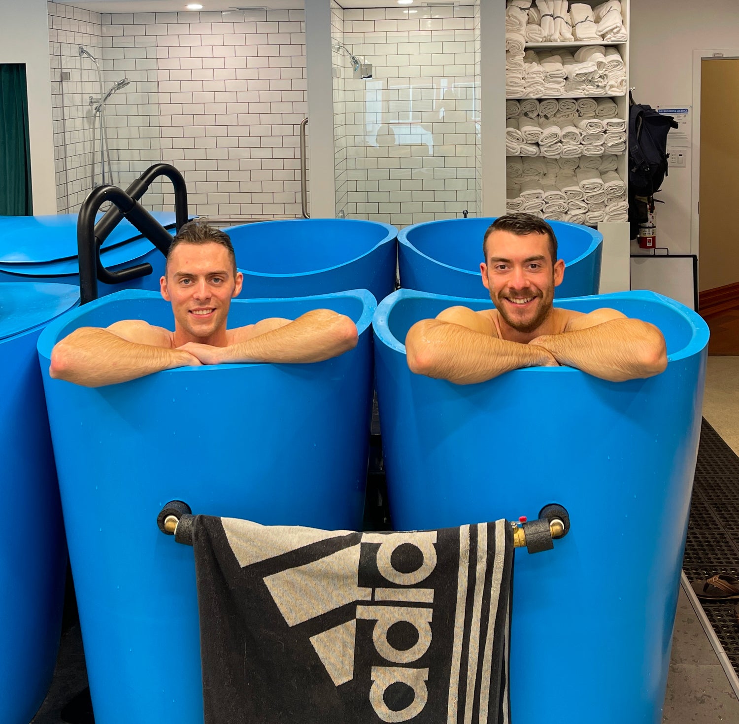 Member booking image - Two guys in separate tubs