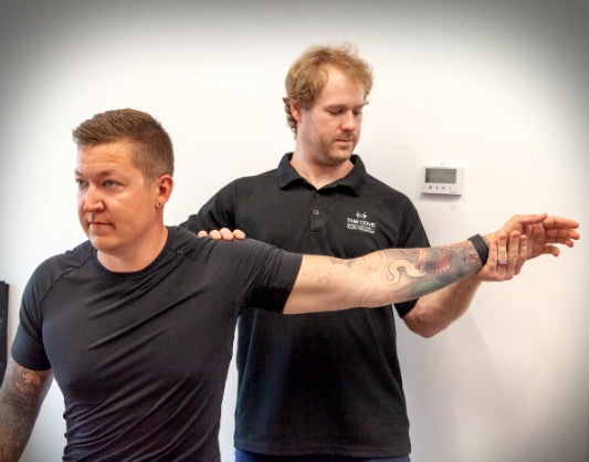 Personalized 1 on 1 stretching session promoting flexibility and mobility, hands-on assistance included